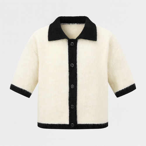 Beige short-sleeve knit shirt with black contrast trim on collar, cuffs, and placket.