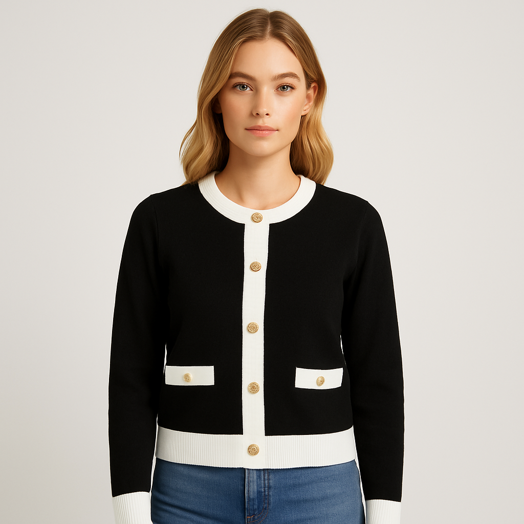 Black knit cardigan with white contrast trims, long sleeves, gold buttons, and round neckline.