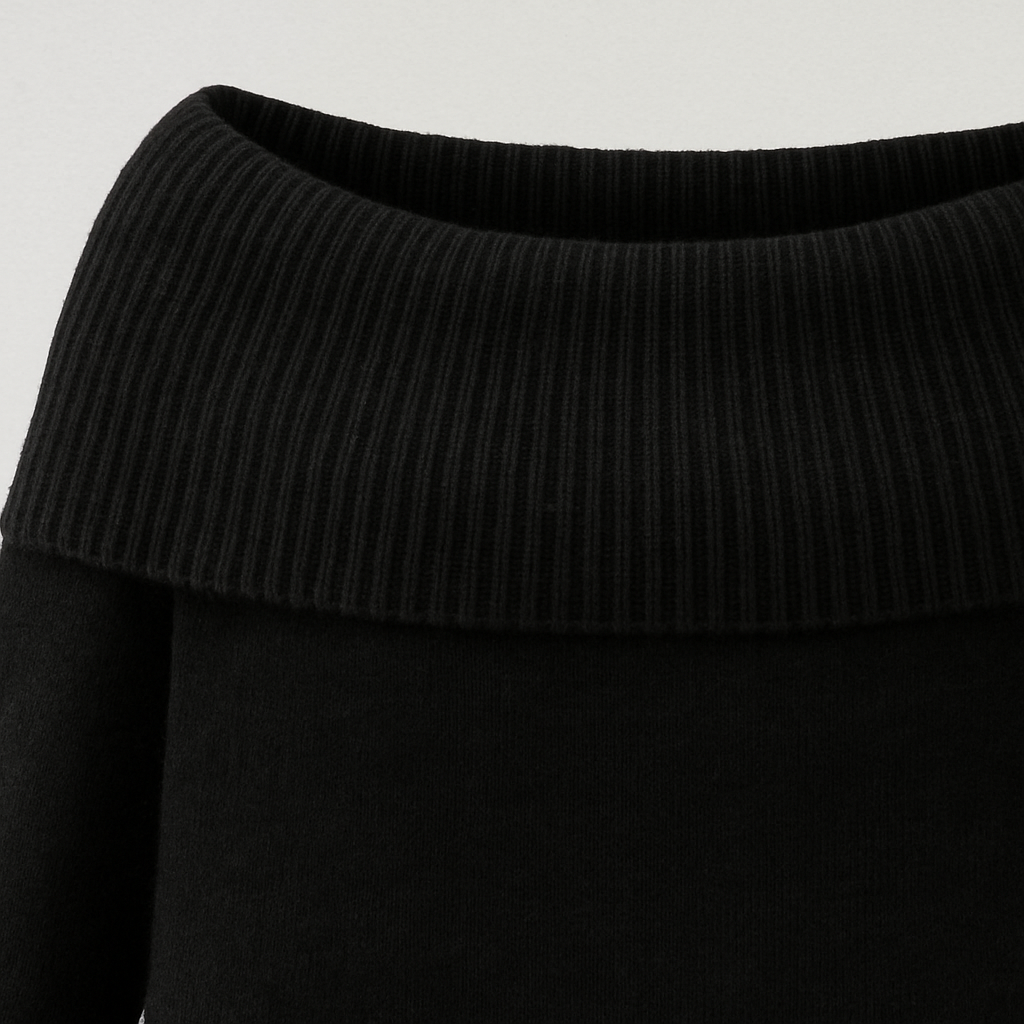 Black off-shoulder sweater with wide fold-over neckline and long fitted sleeves.