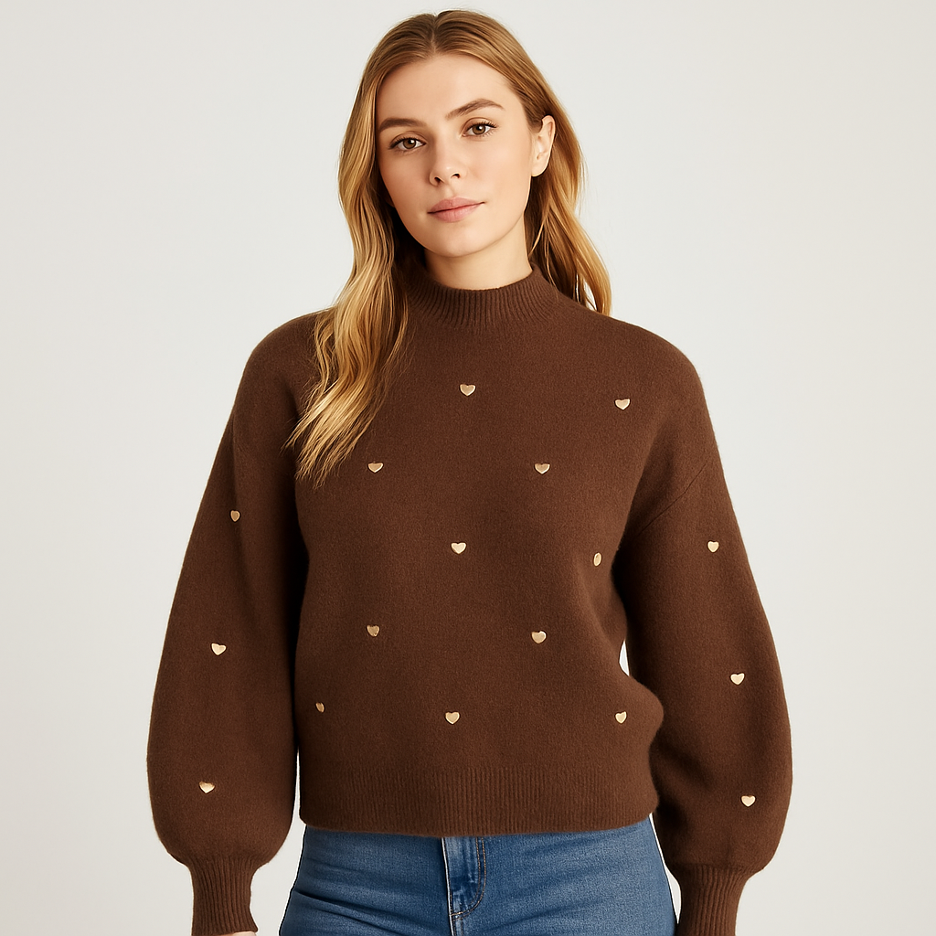 Brown knit sweater with long sleeves and embroidered heart accents.